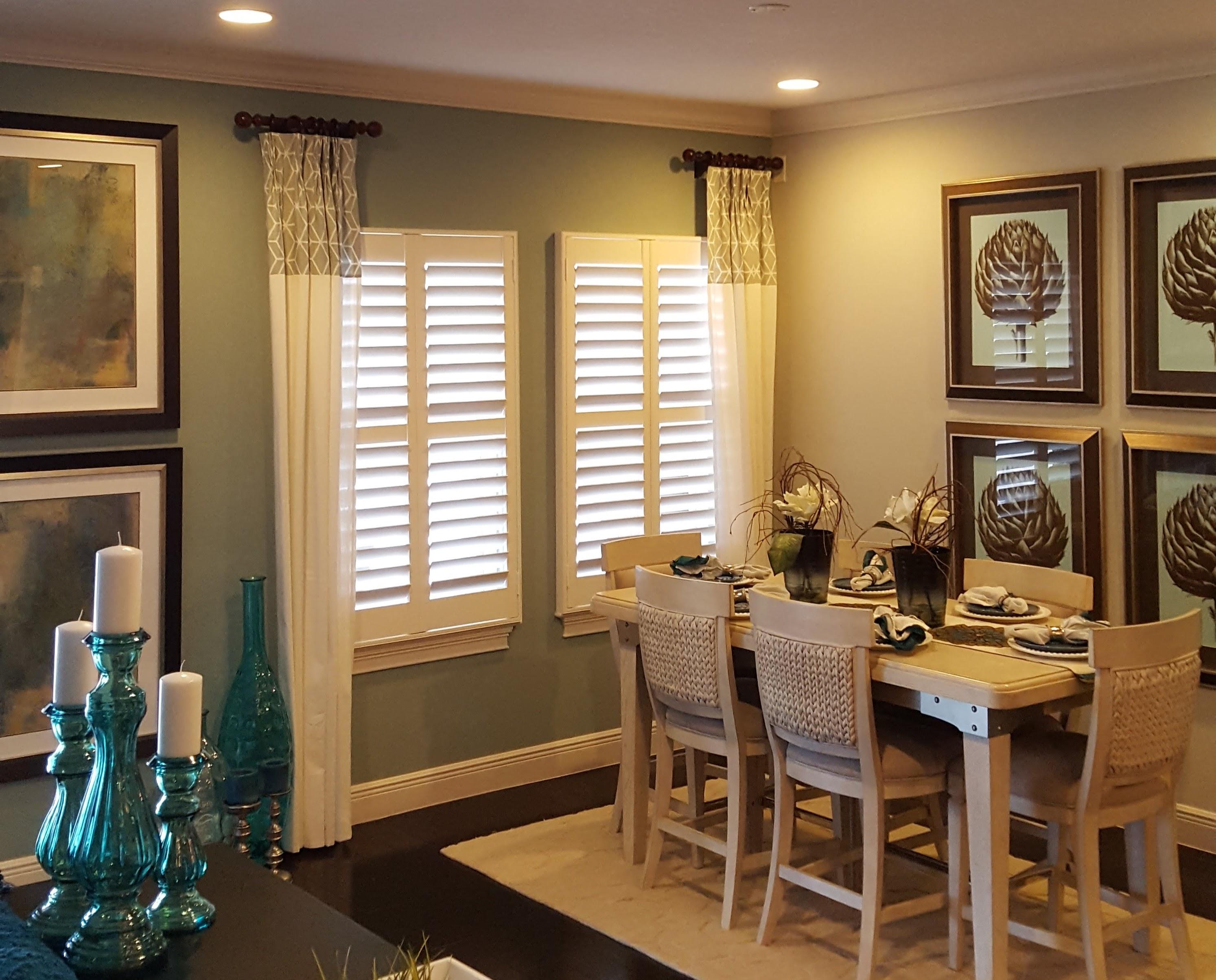 Wood plantation shutters in dining room